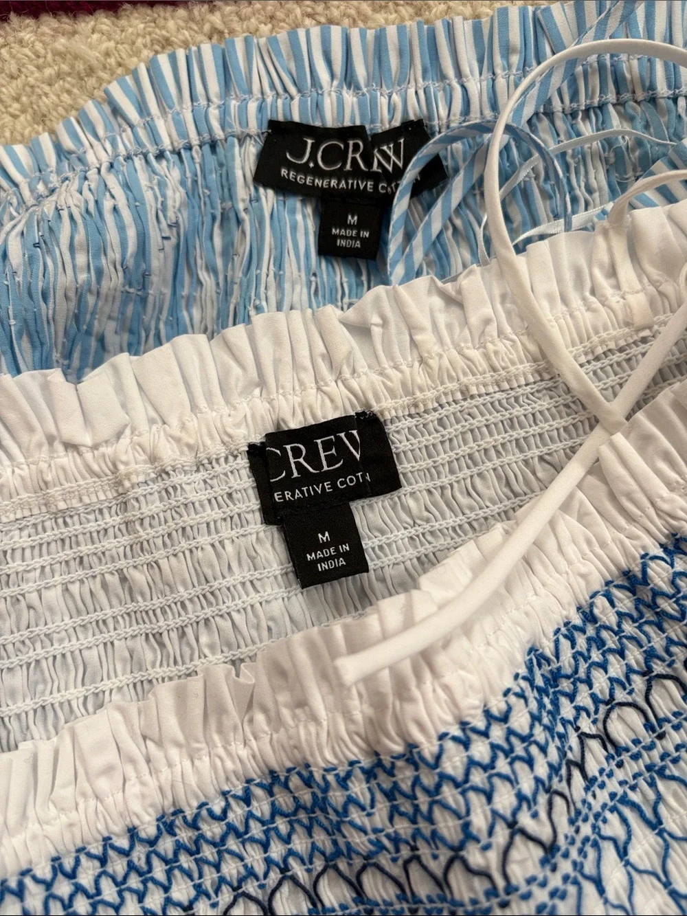 Two new J Crew Smocked Blue & White peplum tops